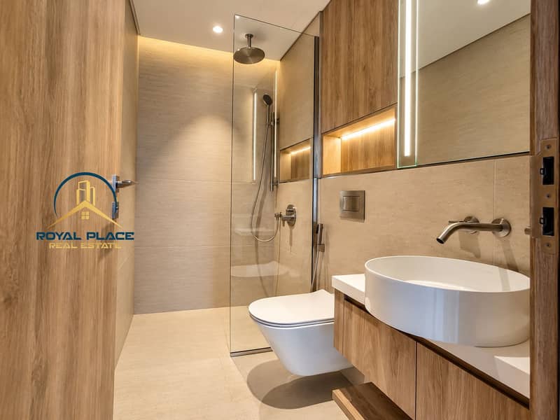 9 Modern Beige-and-Wood Spa Bathroom. png