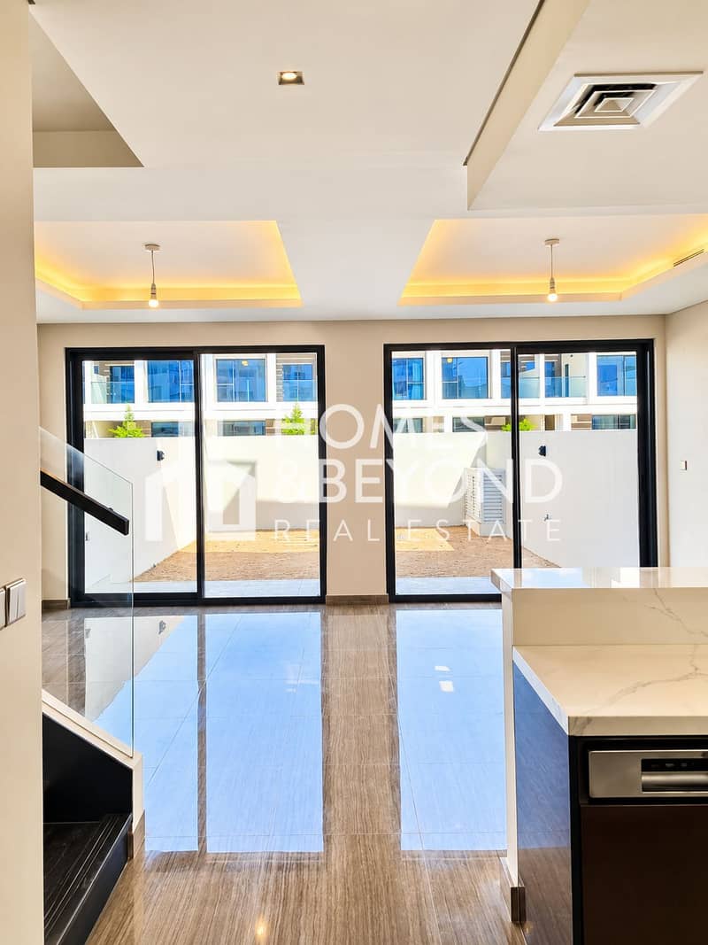 4 Bright Modern Living Space with Patio Views. png