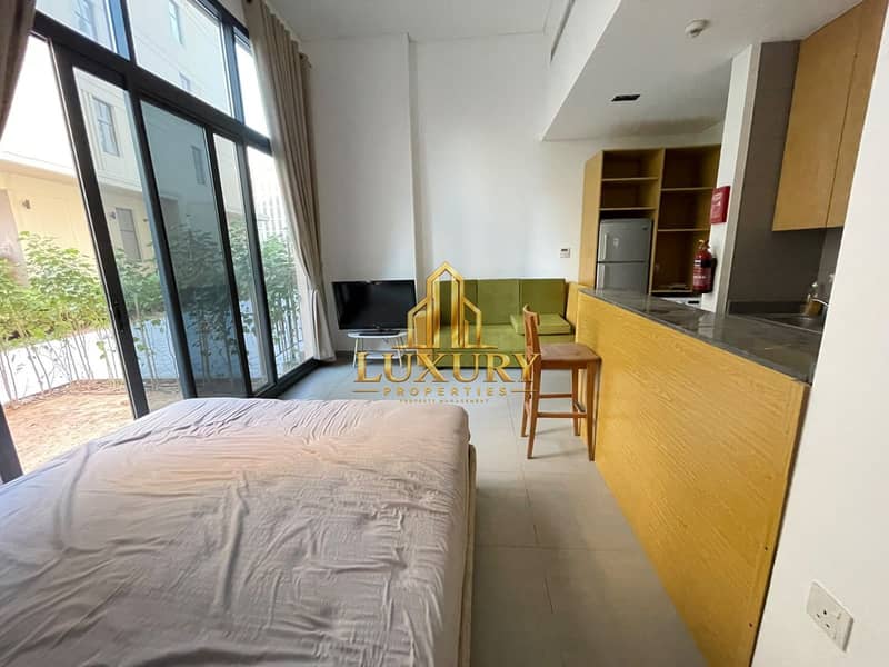 3 Furnished Studio with Private Garden for Rent – AED 38,000 Yearly 🌿🏡
