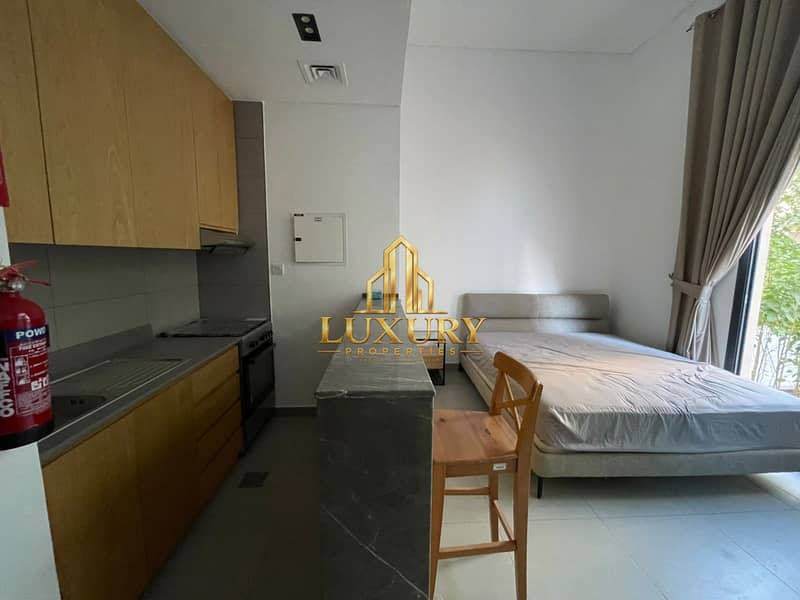 4 Furnished Studio with Private Garden for Rent – AED 38,000 Yearly 🌿🏡