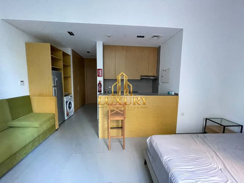 5 Furnished Studio with Private Garden for Rent – AED 38,000 Yearly 🌿🏡