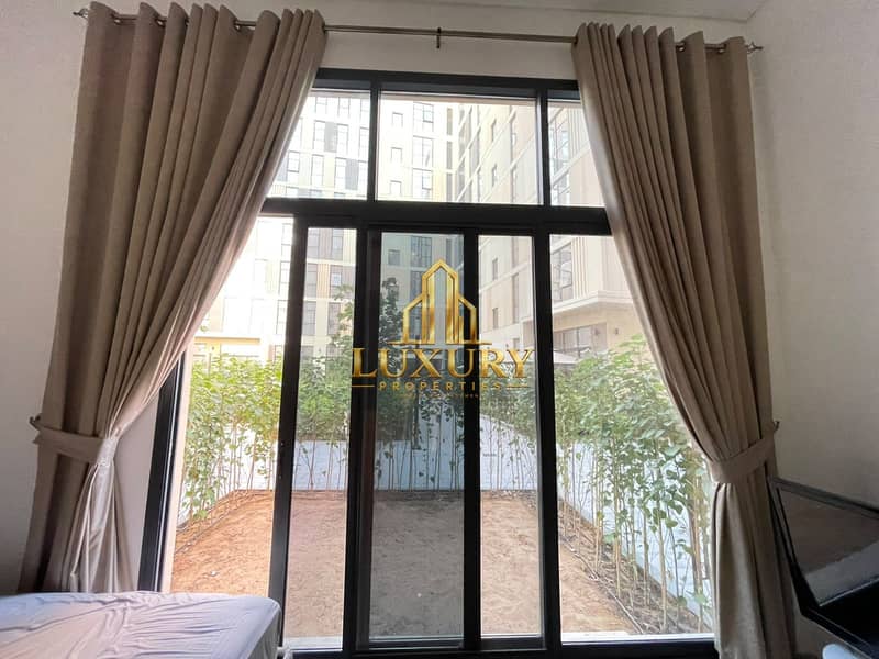 7 Furnished Studio with Private Garden for Rent – AED 38,000 Yearly 🌿🏡