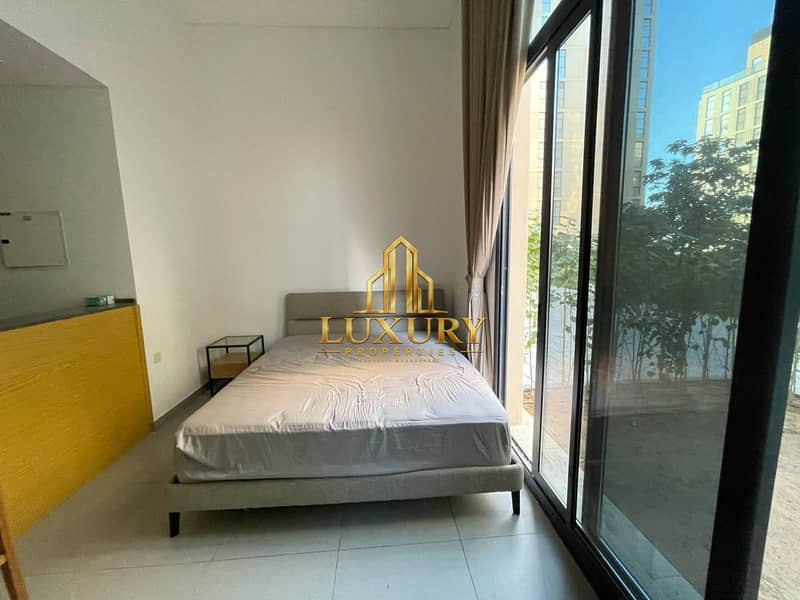 10 Furnished Studio with Private Garden for Rent – AED 38,000 Yearly 🌿🏡