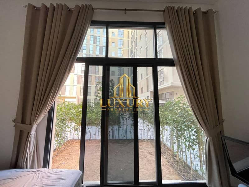11 Furnished Studio with Private Garden for Rent – AED 38,000 Yearly 🌿🏡