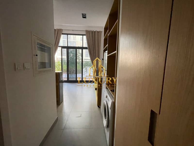 14 Furnished Studio with Private Garden for Rent – AED 38,000 Yearly 🌿🏡