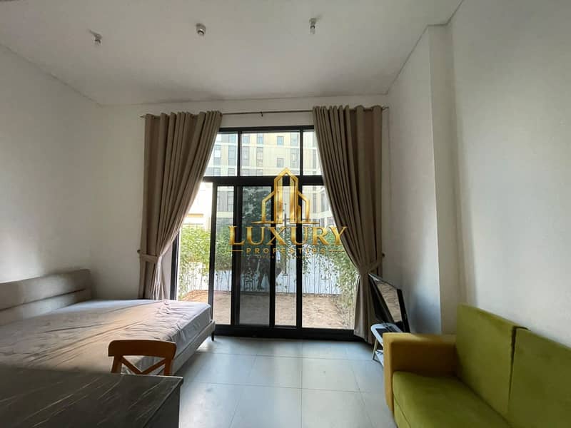 15 Furnished Studio with Private Garden for Rent – AED 38,000 Yearly 🌿🏡