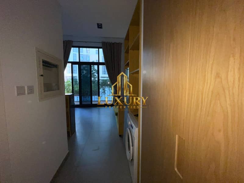 16 Furnished Studio with Private Garden for Rent – AED 38,000 Yearly 🌿🏡