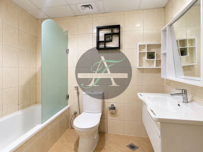 3 Modern Beige Tile Bathroom. png