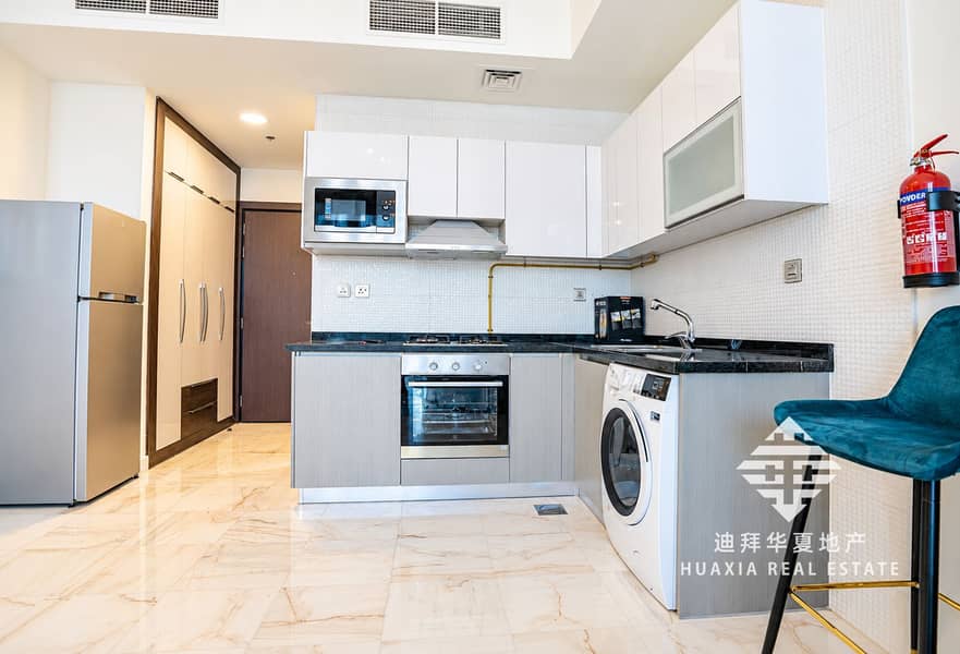 4 Bright Modern Kitchen with Teal Stool. png