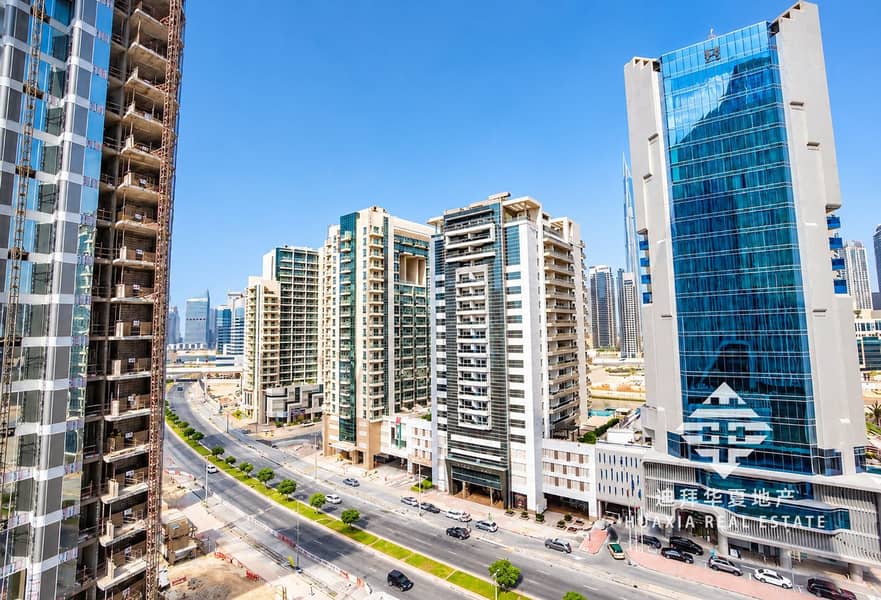 23 Bright Modern Cityscape with Glass Towers. png