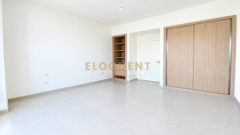 11 Bright Minimalist Room with Built-In Storage. png