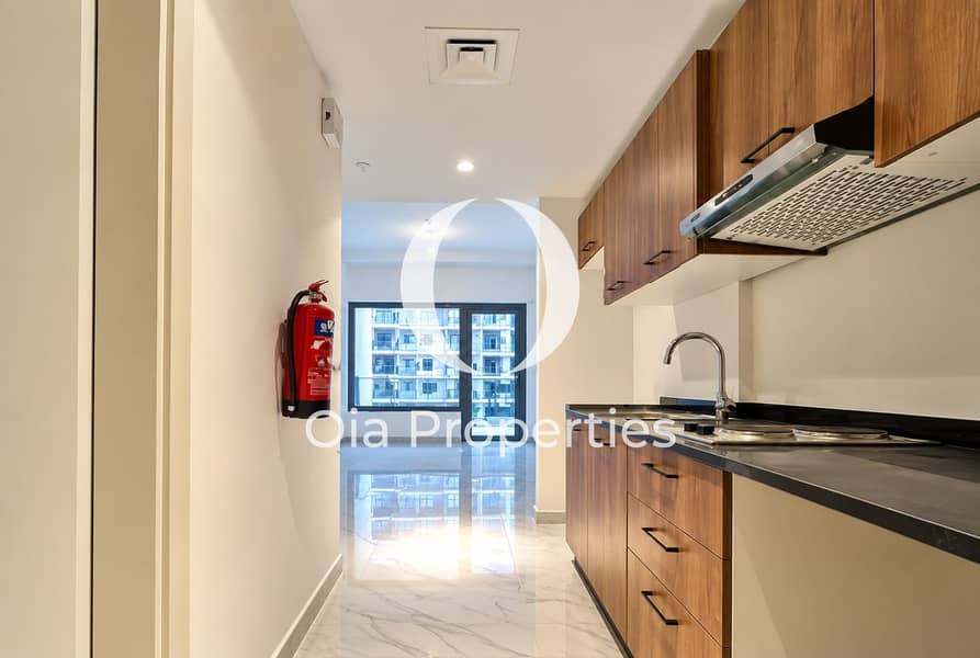 2 Modern Galley Kitchen Toward Balcony. png