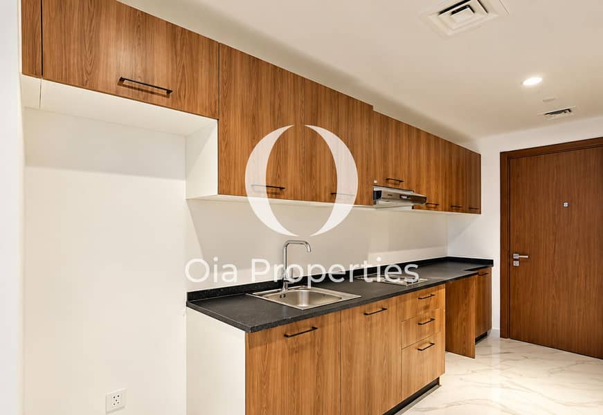 7 Modern Walnut Galley Kitchen. png