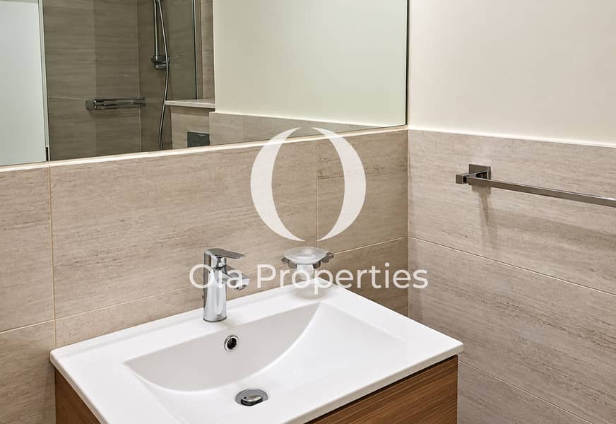 9 Minimalist Beige Stone Bathroom Vanity. png