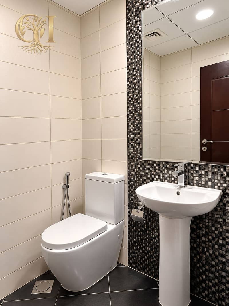 8 Modern Minimalist Bathroom with Mosaic Accent Wall. png