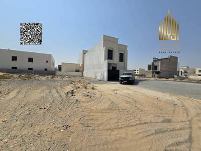 Plot for Sale in Al Helio, Ajman - Prime Plot on a Main Road with a 15-Meter Setback