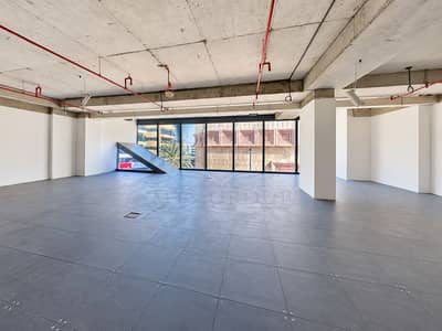 مکتب للايجار في بر دبي، دبي - Sunlit Industrial Shell with City Views. png مکتب للايجار في بر دبي، دبي - Sunlit Industrial Shell with City Views. png