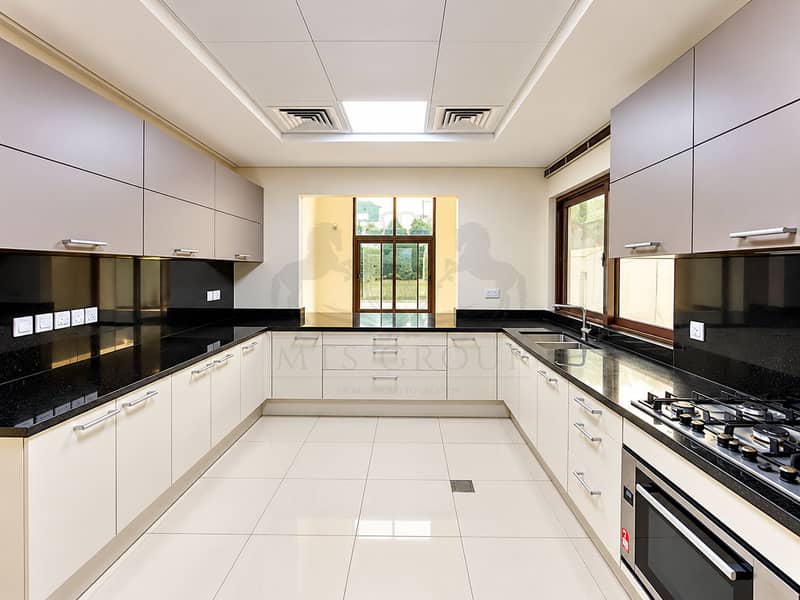 3 Bright Symmetrical Modern U-Shaped Kitchen. png