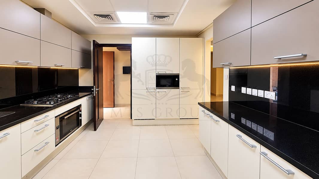 7 Sleek Symmetrical Modern Galley Kitchen. png