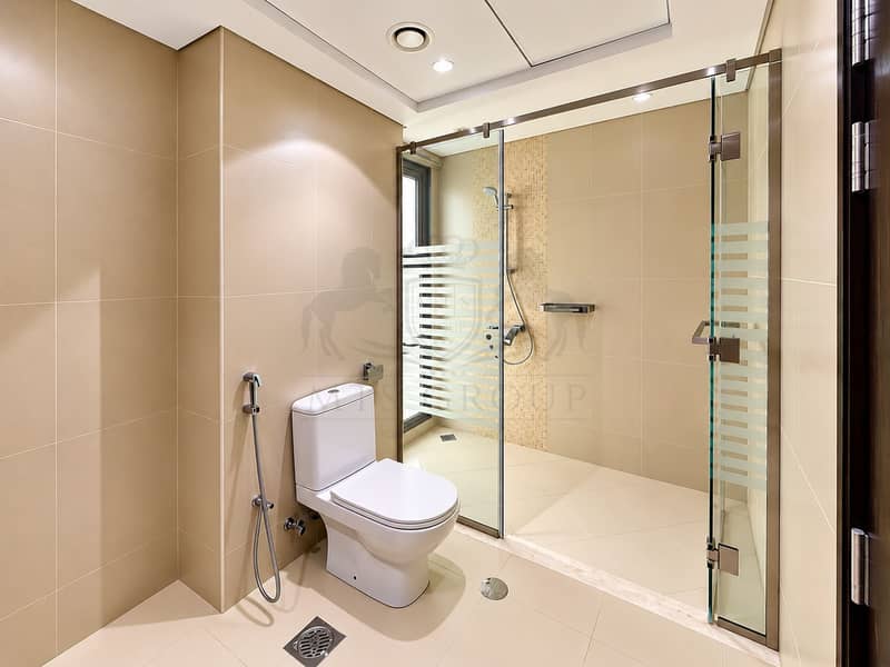 14 Modern Beige Bathroom with Glass Shower(1). png