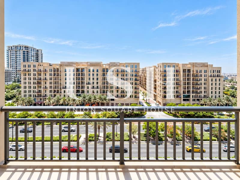 Sunny Balcony View Over Modern Boulevard. png Sunny Balcony View Over Modern Boulevard. png