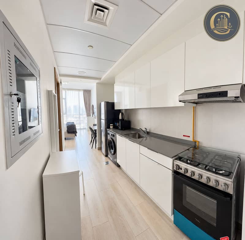 7 Sunlit Modern Studio Kitchen Hallway. png