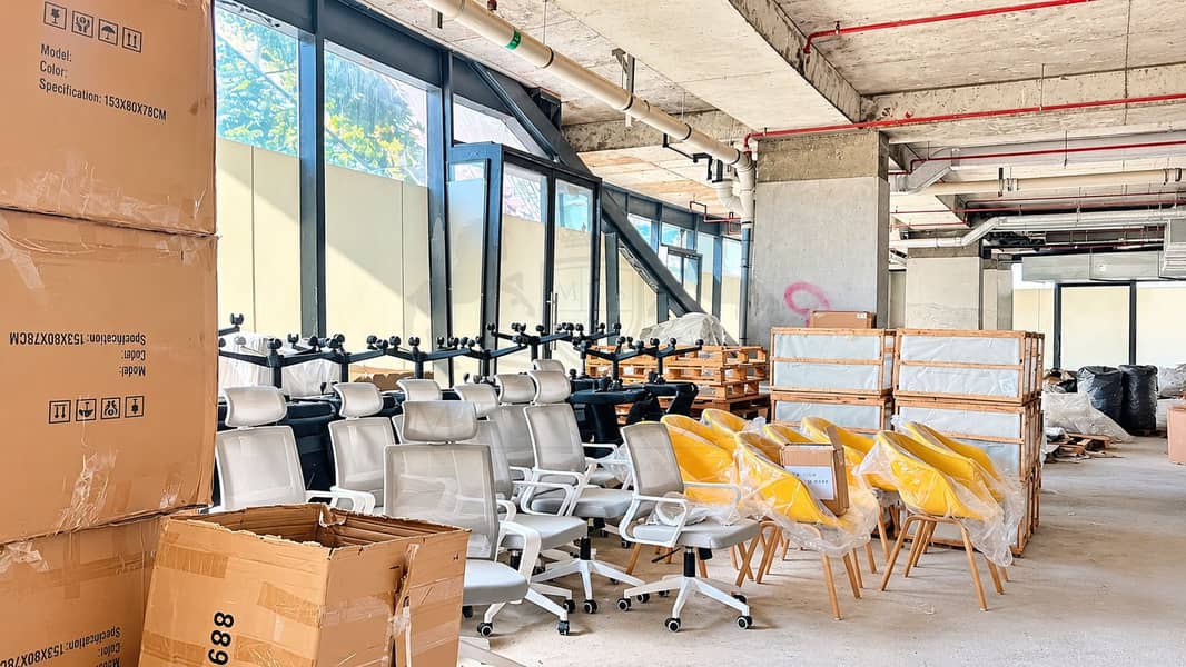 2 Daylit Warehouse of Stored Office Furniture. png