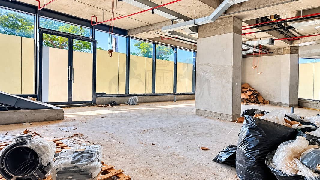9 Sunlit Unfinished Retail Interior. png