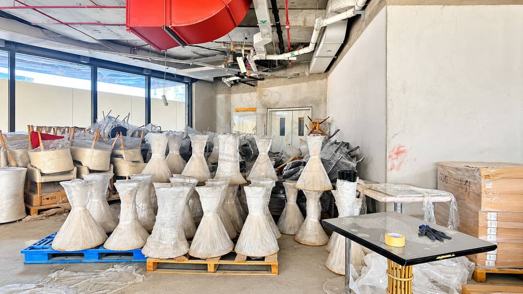 16 Wrapped Furniture in Industrial Storage Warehouse. png