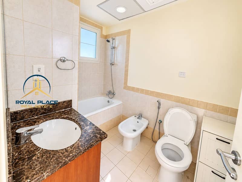 10 Bright Modern Beige Bathroom. png