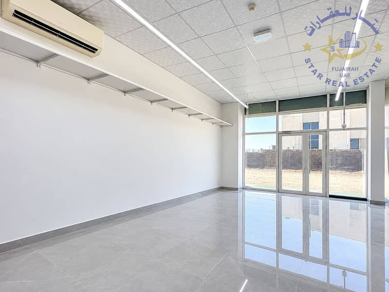 6 Bright Empty Modern Storefront Interior. png