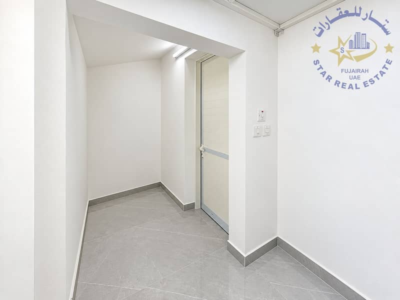 12 Minimalist White-Tiled Entry Alcove. png