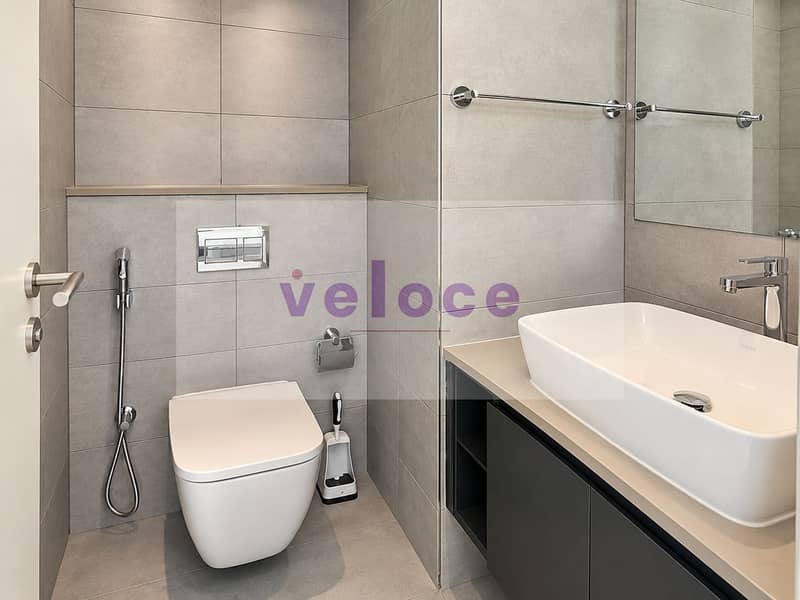 7 Modern Gray-Tiled Bathroom Interior. png