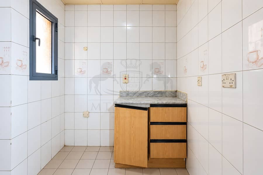 3 Bright Minimalist Tiled Utility Room. png