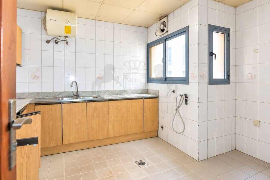 2 Bright Tiled Utility Kitchen. png