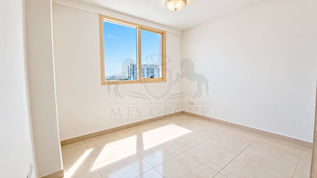 5 Bright Minimal Room with City View. png