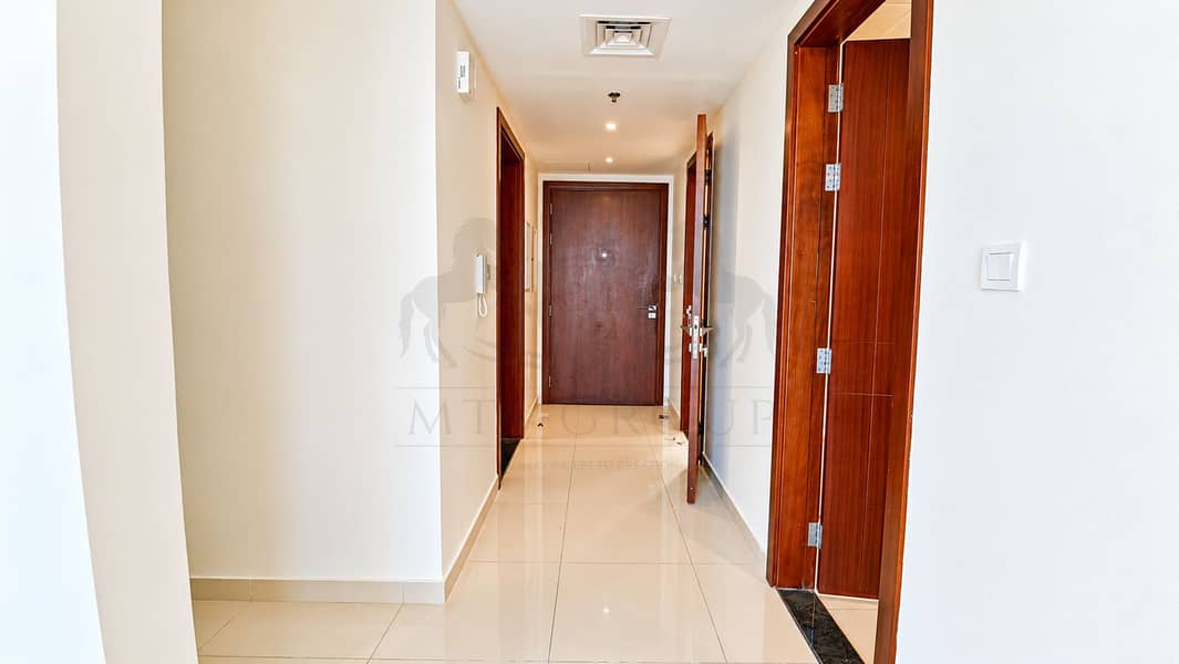 10 Modern Hallway with Wood Entry Door. png