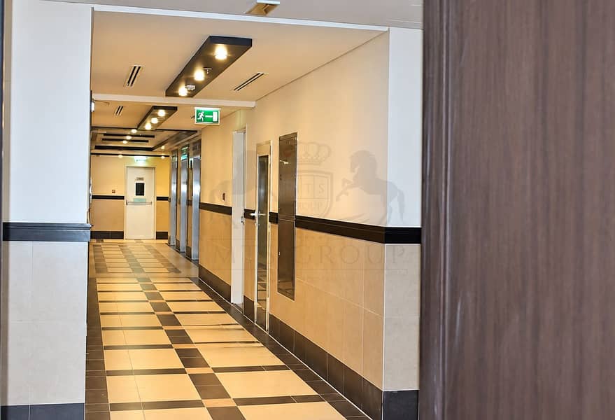 9 Modern Hallway with Exit Sign. png
