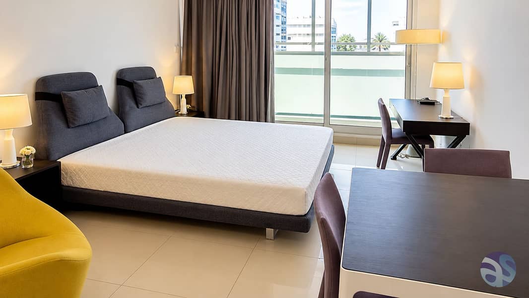 3 Modern Studio Bedroom with City Balcony. png