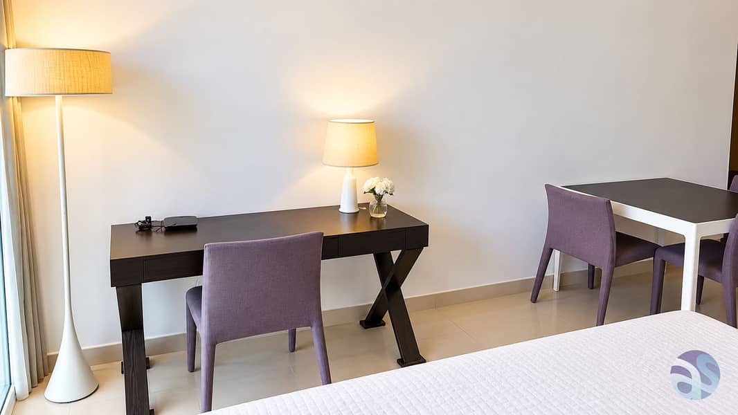 5 Warm Minimalist Hotel Workspace. png