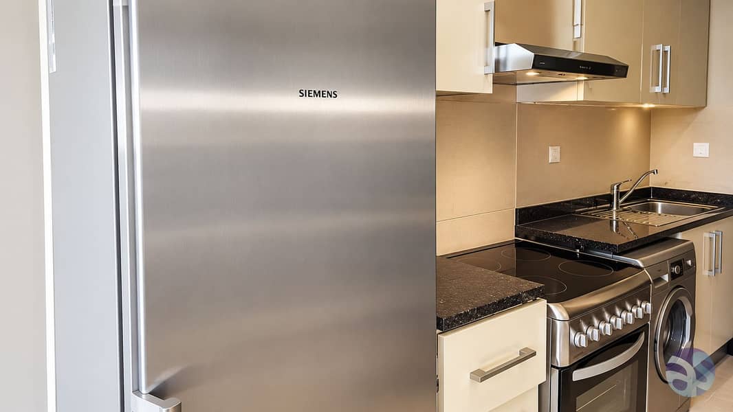7 Modern Kitchen with Stainless Steel Appliances. png