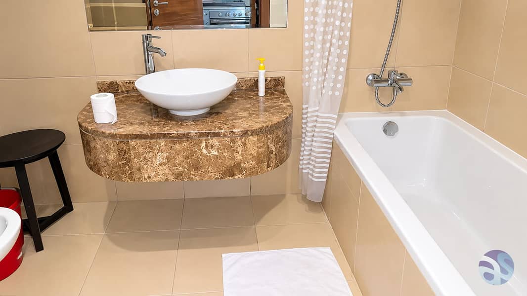 8 Modern Beige Bathroom with Marble Vanity. png