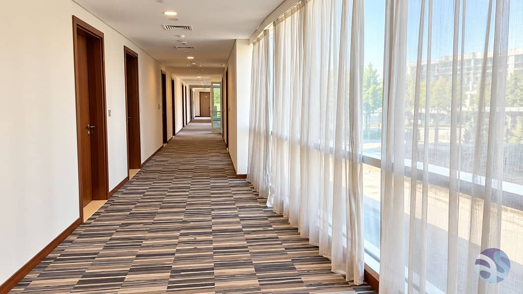 9 Bright Modern Hotel Corridor with Sheer Curtains. png
