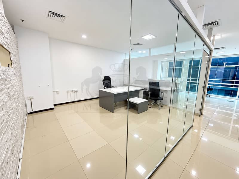 11 Modern Glass-Walled Executive Office. png