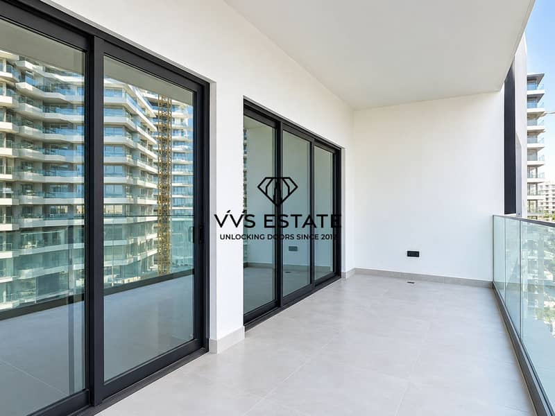 14 Modern Balcony with Reflective Glass Doors. png