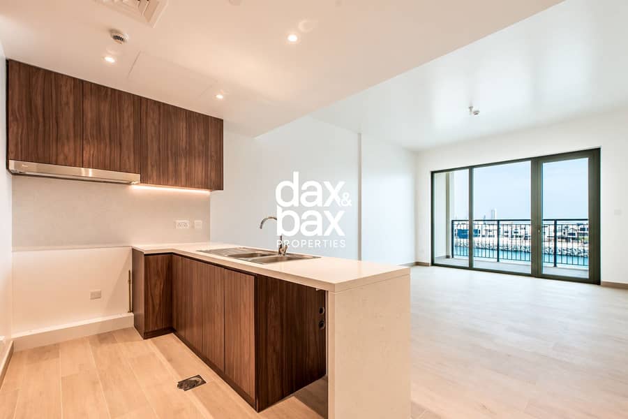 4 Modern Waterfront Apartment Kitchen and Living Area. png