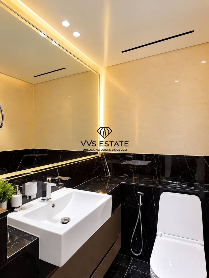 9 Luxury Marble Bathroom with Warm Lighting. png