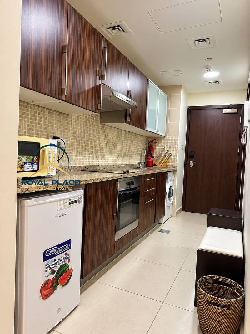 7 Modern Galley Kitchen and Entryway. png
