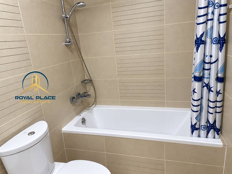 10 Modern Beige Bathroom with Nautical Curtain. png