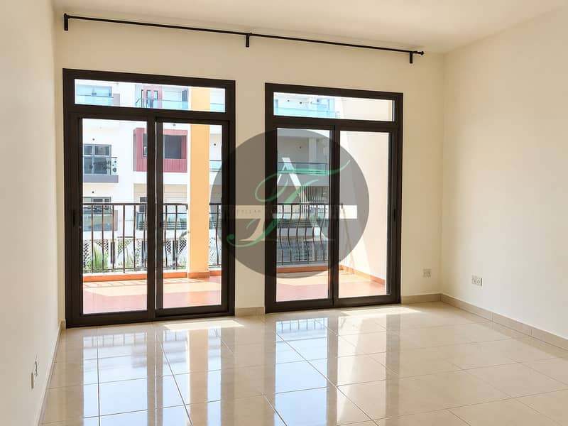 2 Bright Empty Apartment with Balcony Views. png